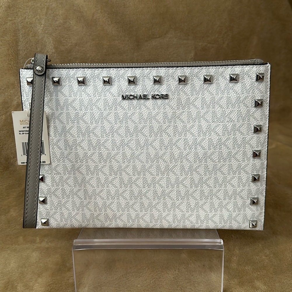 Micheal kors wristlet with studs 10x7 new